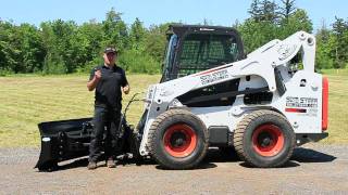 Skid Pro Skid Steer 6 Way Dozer Blade Demo [upl. by Namso428]