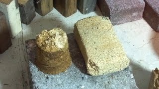 010813 Reginalds Rocket Stove SAWDUST BRICK [upl. by Arutnev]