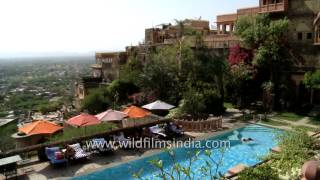 Swimming pool area at Neemrana Fort Palace hotel Rajasthan [upl. by Winn108]