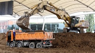 CAT 325C LN 365B L 966H  MercedesBenz Arena Stuttgart 17062010 [upl. by Anuahs815]