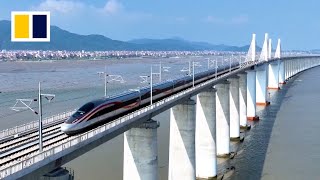 China launches first crosssea bullet train line [upl. by Alyt502]