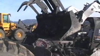 totally trucks  Skid Steer Hands off Scrap Engines to Loader [upl. by Keenan]