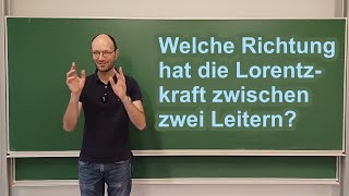 Richtung der Lorentzkraft zwischen zwei stromdurchflossenen Leitern mit RechterHandRegel bestimmen [upl. by Vanderhoek252]