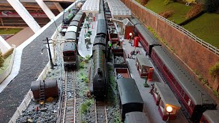 A grand tour of a huge OO gauge loft model train railway set [upl. by Spevek]