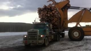 Wagoner unloading log truck [upl. by Nahtal]