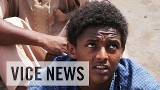 Witness to Islamic State Atrocities Extra Scene from ‘Libya’s Migrant Trade’ [upl. by Ardnuhsal]