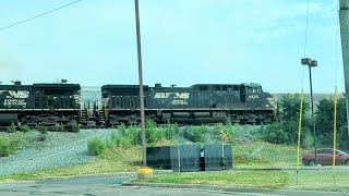 NS Eastbound pulls beside and passes Northbound CSX autorack with midtrain DPU [upl. by Adnim]