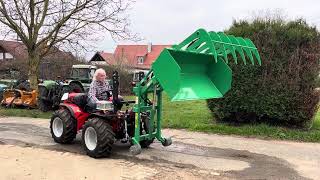 Hecklader  Theilmann Landtechnik GmbH  Carraro mit Heckloader Krokodilgebiss Heckstapler Schaufel [upl. by Kciremed]