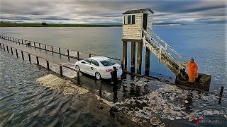 DRONE FILMS UBER TAXI PARTING THE SEA AND GETS STUCK ON HOLY ISLAND CAUSEWAY [upl. by Nivri161]