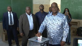 DR Congo President Felix Tshisekedi votes in Kinshasa  AFP [upl. by Iolenta]