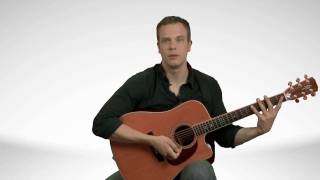 How To Hold An Acoustic Guitar  Guitar Lessons [upl. by Tsai]