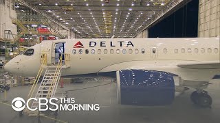 New Delta Airbus A220 features wider coach seats [upl. by Anawqahs]