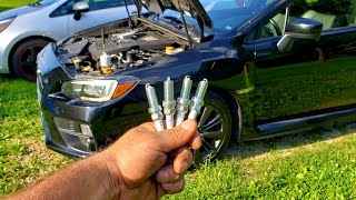 Subaru WRX STI  tutorial on how to change spark plugs [upl. by Ynney388]