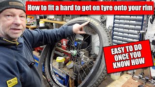 How to fit a really difficult fitting tyre to a Bike wheel [upl. by Ayom]