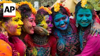 Holi festival celebrated with bursts of color across India [upl. by Annavoj]