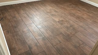 Installing Wood look ceramic tile [upl. by Anidene]