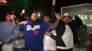 Fans outside Dodger Stadium ecstatic after seeing Dodgers win pennant [upl. by Arlin]