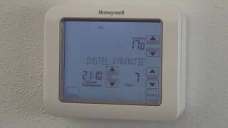 Vakantieprogramma instellen met Chronotherm Touch Modulation  Honeywell Home [upl. by Llerral350]