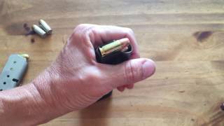 How to Load A SemiAuto Handgun Magazine [upl. by Enneyehc]