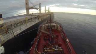 Bunker barge going alongside bulk carrier [upl. by Eedyaj997]