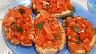 Grilled bread rubbed with garlicClassic Italian appetizer Italian bruschetta [upl. by Ennaihs]