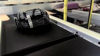 Baggage Handling with TiltTray Sorter [upl. by Ymot]