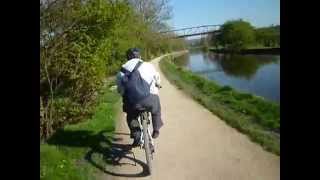 Cycling on the Leeds Liverpool Canal towpath near Rodley [upl. by Ainahpets399]