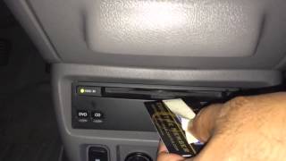 How to remove a stuck DVD or CD from a slot DVD player [upl. by Newfeld841]