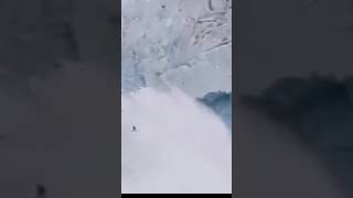 Glacier fall glacier calving Large iceberg breaking over Iceberg breaking up glacier collapse [upl. by Olinde]