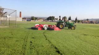 Trimax Pegasus 16 wing mower on a John Deere 5065M [upl. by Britt]