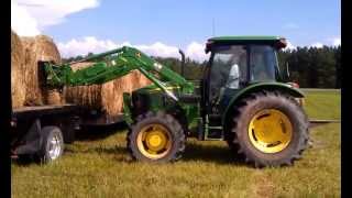 John Deere 5093e loading hay [upl. by Sirenay]