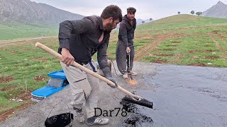 Hamidreza and brothers Applying a bitumen layer on the roof and ceramic floor [upl. by Manthei]