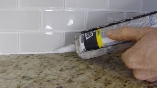 How To Install Caulk On A Kitchen Tile Backsplash [upl. by Cad]