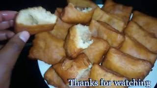 HOW TO MAKE CINNAMON  CARDAMOMS HALF CAKE SOFTSWEET MANDAZI  mandazi ya iliki [upl. by Wolliw]