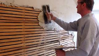 Traditional Lime plaster on laths first coat of lime plaster onto a lathed wall in Kent  2018 [upl. by Blaine]