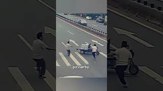 Man Risks Life to Stop ThreeWheeler and Save Child [upl. by Ynnatirb]