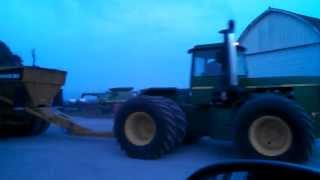 John Deere 8850 pulling Miskin DW 25 wagons loaded [upl. by Oirottiv]