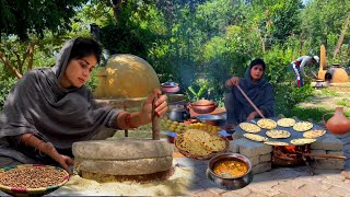 Grinding Gram Flour on Stone Mill and cooking Tawa Missi Bread with Handi Paneer in the Village Il [upl. by Oriole]