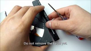 How to safely remove bezel  frontplate from dvd or bluray drive [upl. by Westney76]