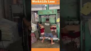 Using a hydraulic press to compress blankets in preparation for packaging and shipment [upl. by Feinberg]