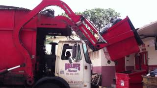 Rolloffs Hawaii Garbage truck Mammoth front Loader [upl. by Akimrehs]