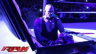 Undertaker rises from a coffin to attack Brock Lesnar Raw March 24 2014 [upl. by Malva81]