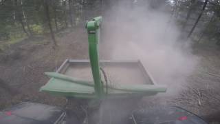 Spreading of nontreated wood ash [upl. by Htyderem]