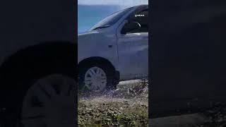 Car splashing water on road [upl. by Bently]