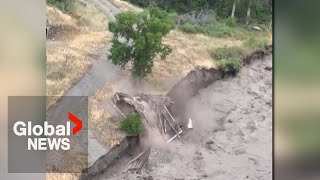 BC landslide Structure washed away after water tops Chilcotin River site video shows [upl. by Amble141]