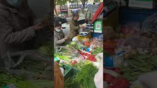 Mobile vendors selling fruits and vegetables on the streets of Xian usually at very cheap prices [upl. by Sanbo938]