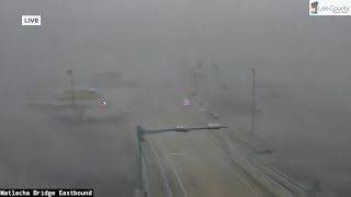 Hurricane Milton Tornado sweeps over bridge during meteorologists live report [upl. by Atekehs782]