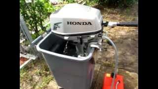 2004 Honda 5hp 4 stroke tiller outboard motor [upl. by Yromem]