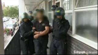 Riot police raid suspected looters in London [upl. by Aneehsat]