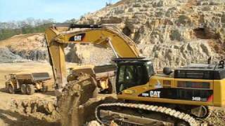 Caterpillar 345D loading Caterpillar 740 and Volvo A30E [upl. by Gayner]